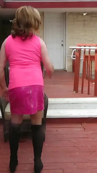 Brittney CD modeling her new pink outfit and boots