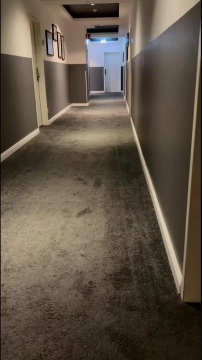 Naked in the hotel corridor
