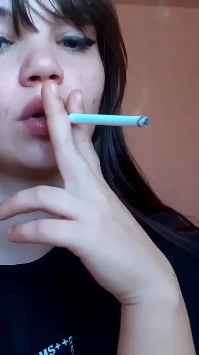 Big luscious lips with natural color lipgloss smoking cigarette Clip 1