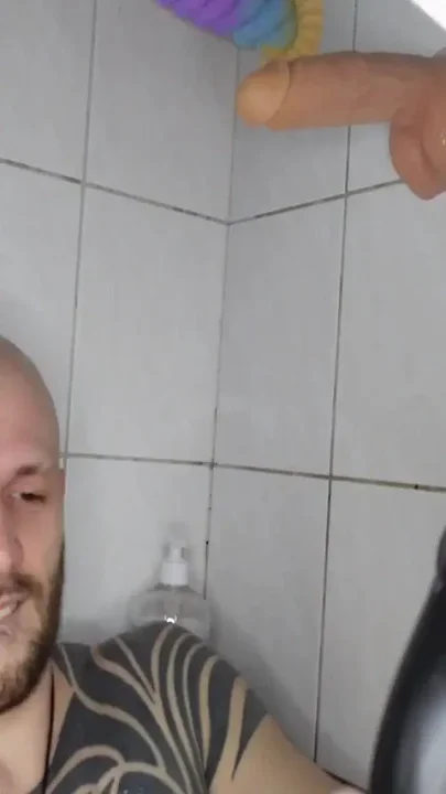 Bald Guy Taking Huge Dildo in the Ass in the Bathroom