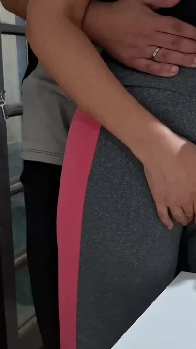 Masturbating her camel toe on the table with the neighbor's help Clip 1