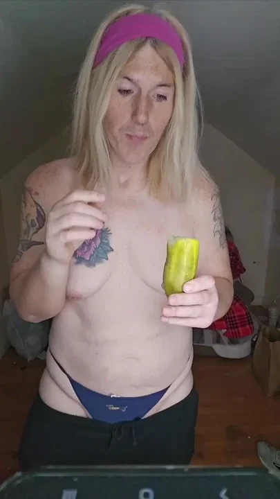 Horny trans girl eats a deli pickle
