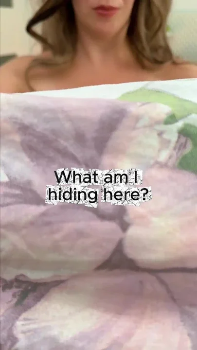 A MILF shows herself in bed her breasts are gorgeous