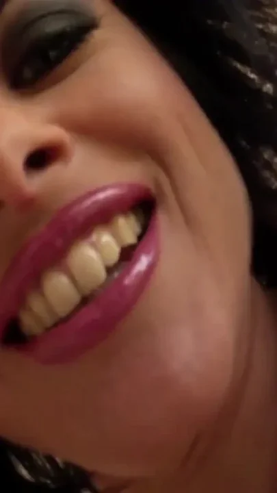Bitch gags on one cock as another drills her pussy from behind