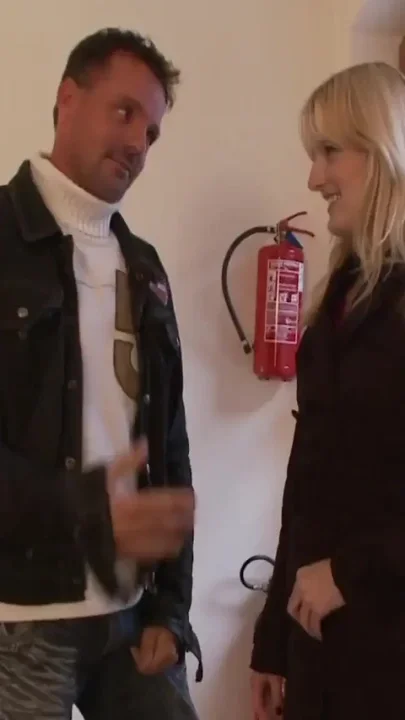 Stairway handjob with submissive blonde