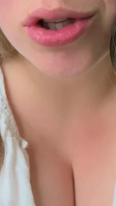 A kiss from a busty MILF