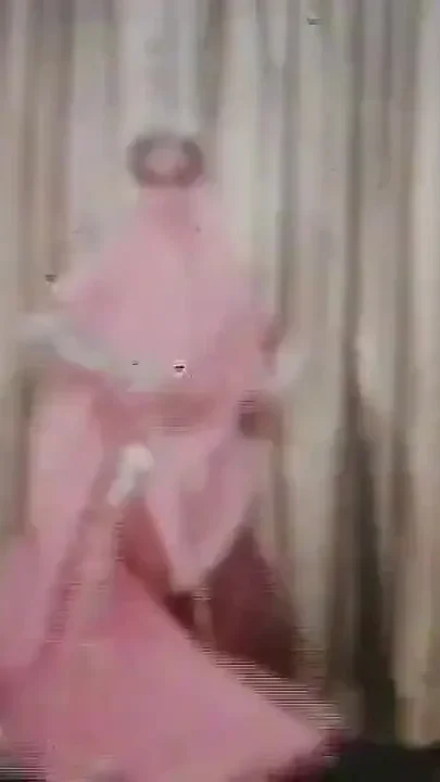 Vintage brunette stripper dancing