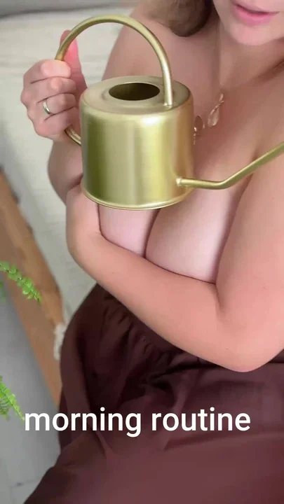 MILF waters flowers without a bra