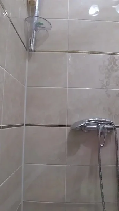 The camera is watching a mature chubby milf in the shower Gorgeous fat ass big