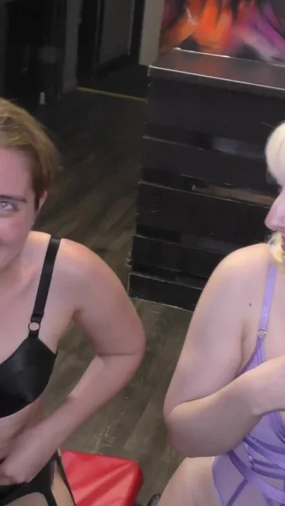 Hot Blonde and Brunette Getting Showered with Warm Cum