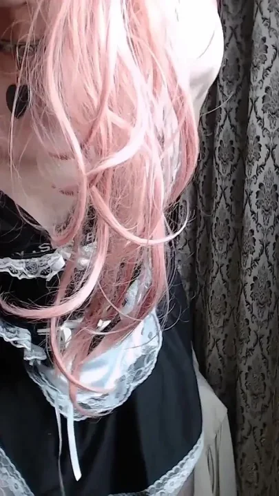 A Transvestite a Slutty Girl in a Maid's Dress Records Herself on Webcam