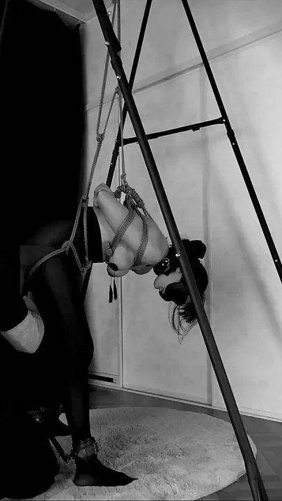 A Woman Tied up in an Embarrassing Position Has Erect Nipples