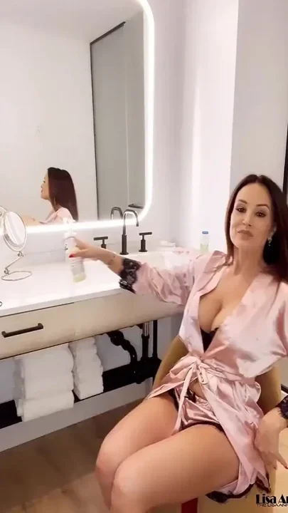 Lisa Ann Plays with Her Toy in Bathroom
