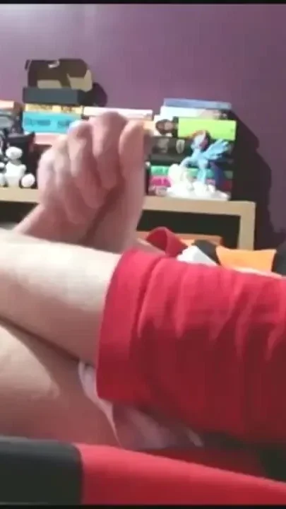 Sammy Andrews cumming on black superhero underwear