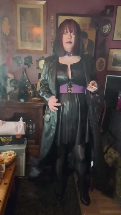 Smoking Mature Tina Snua Smoking A Cigarette In A Full Length Leather Coat - Smoker Clip 1