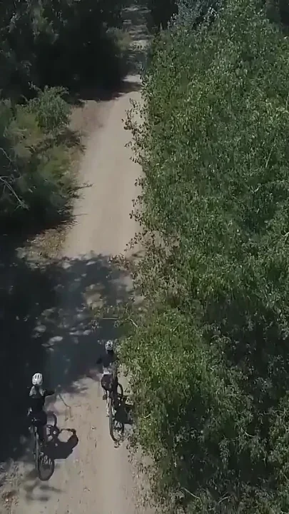 Two hot big breasted MILFs having a threesome with a toyboy in the open air