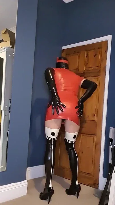 All prepared for my afternoon shift wearing my red latex nurse uniform