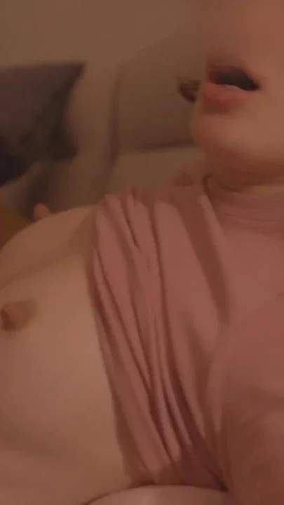 A slender beauty is having a great time on the couch Clip 2