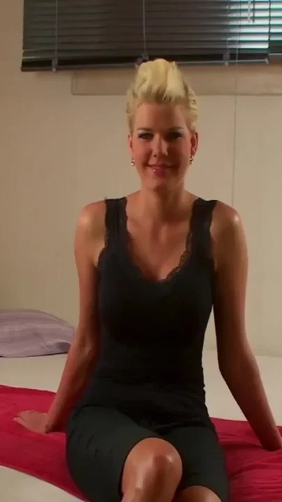 Super sexy blonde babe with huge boobs is toying her pussy