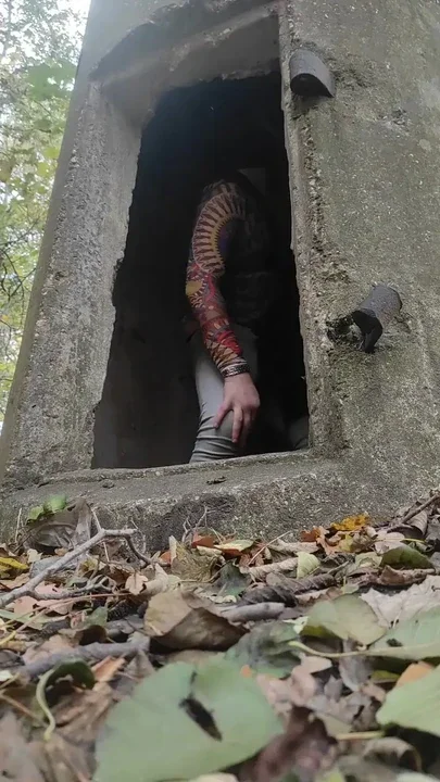Exhibitionist crossdresser out in the woods in the bunker almost caught giving