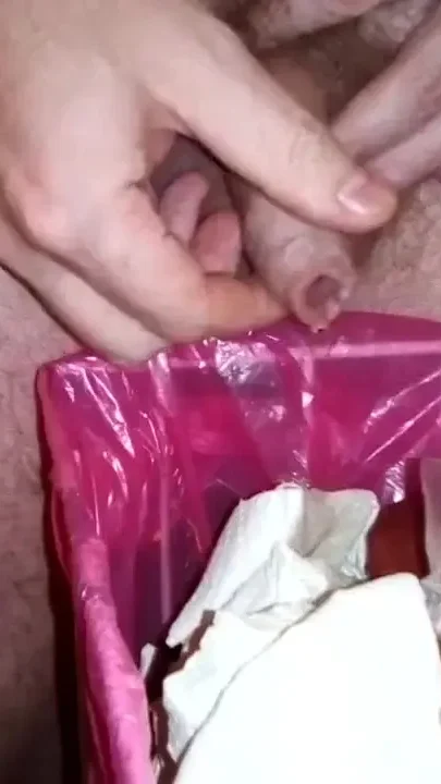 John is pissing it all into the trashcan