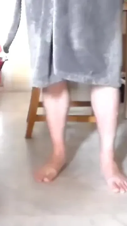 John is peeing all on his robe