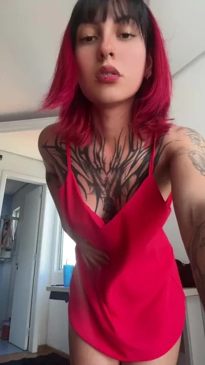 big ass brazilian tattoo and red dress