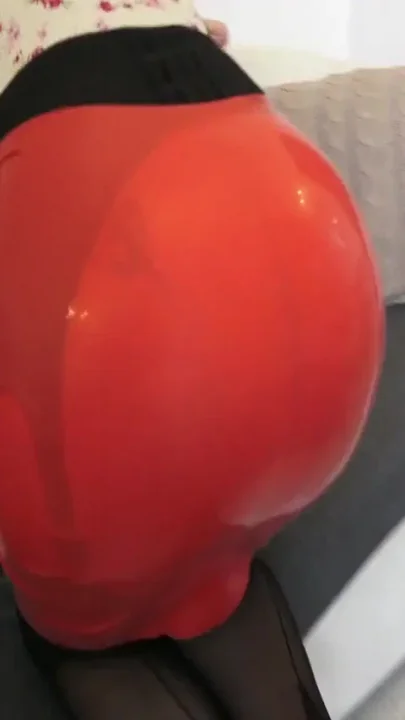 Black stockings and red latex skirt