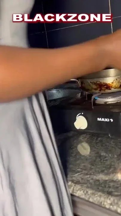 I came to the kitchen to disturb her small while she's cooking Clip 1