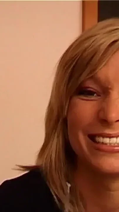Horny Blonde MILF Smiles Seductively Ready for Filthy Fun