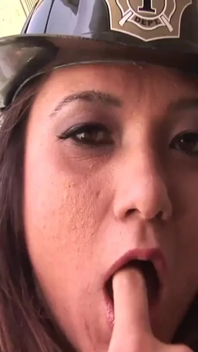 Hot firewoman gives a stunning blowjob to a man on fire