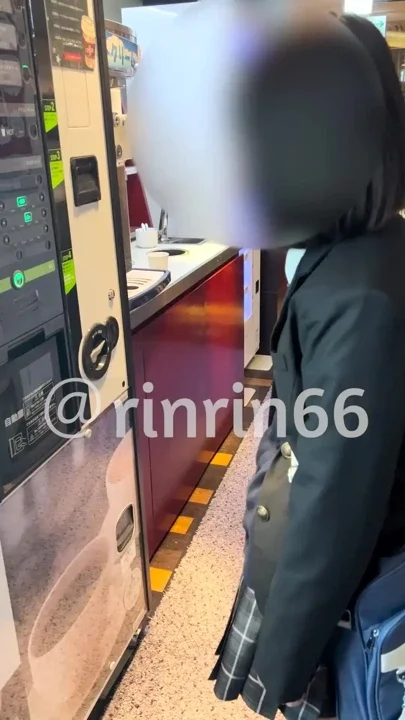 Still in her uniform she holds back her voice in an internet