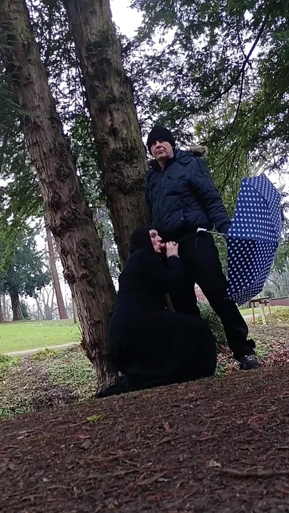 Muslim woman plays and blows a large cock outside in the park Clip 2