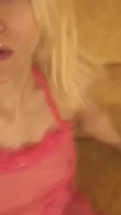 Skinny blonde in sexy lingerie is masturbating on the sofa
