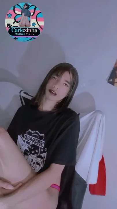 Carlezinha Naked TRANS slut twerking in a cropped top with hard cock escaping