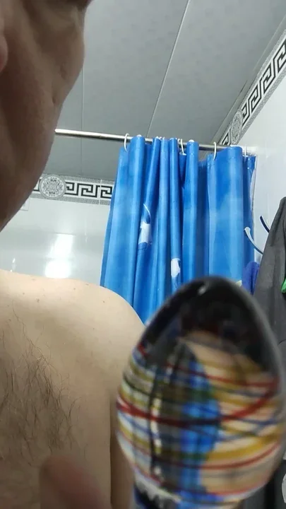 Guy licks and sucks glass dildo