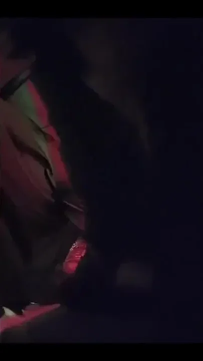 Naughty Brunette in the Dark Room Doing Stripetese