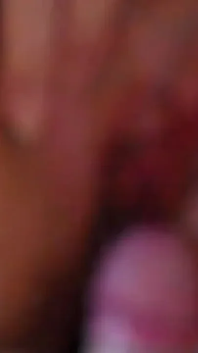 Closeup of Jen peeing on Johns cock