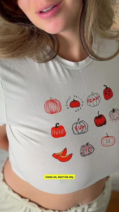 Large breasts and a pumpkin-patterned blouse