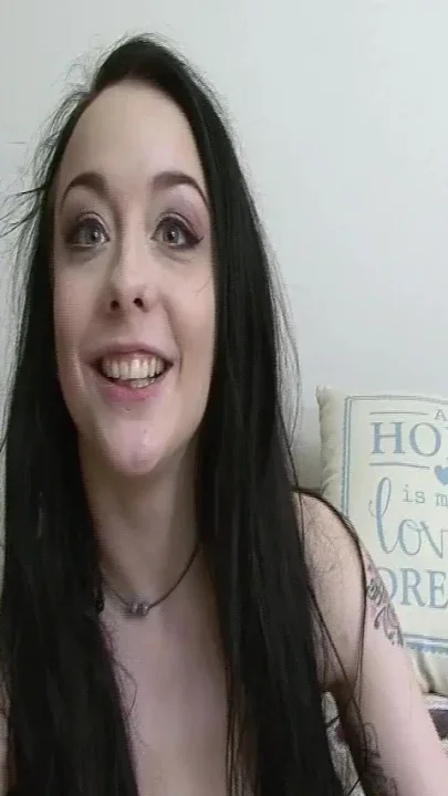 Tattooed Brunette Gets Fingered on the Couch and Cums Hard