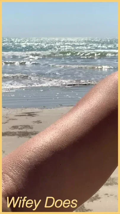 Wife walks around public beach fully nude