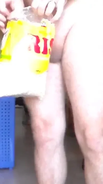 John is peeing all into a rise bag