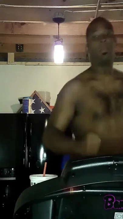 Sweaty jock jerking huge cock after workout