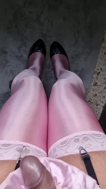 New pink bright stockings rubbing high heels Clip 1
