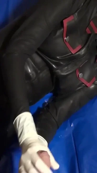 Latex Danielle in latex mask massage his toy