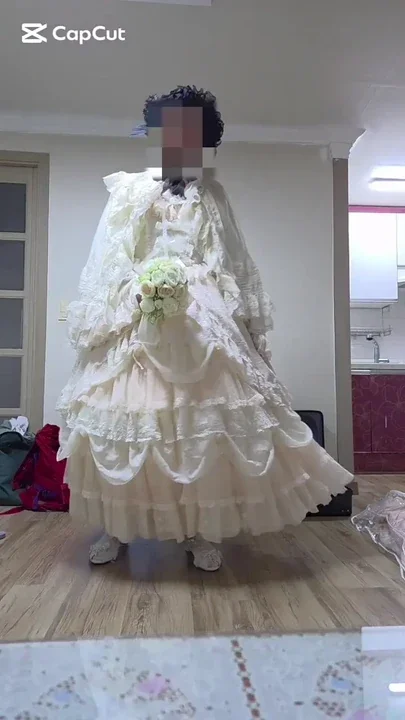 Crossdresser masturbating in a dress