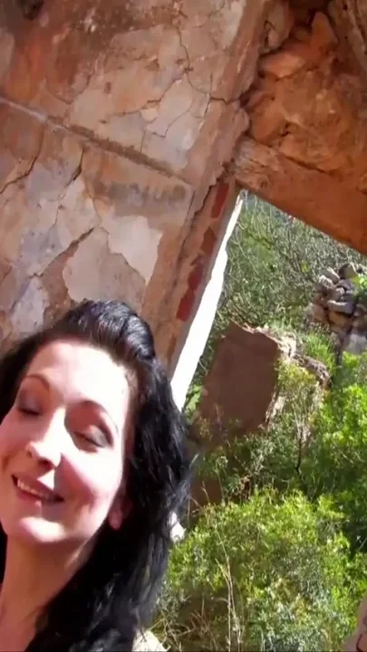 Brunette ass banged through the ruins of an house in the countryside