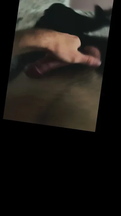 A naughty guy is stroking his cock and riding a thick dildo