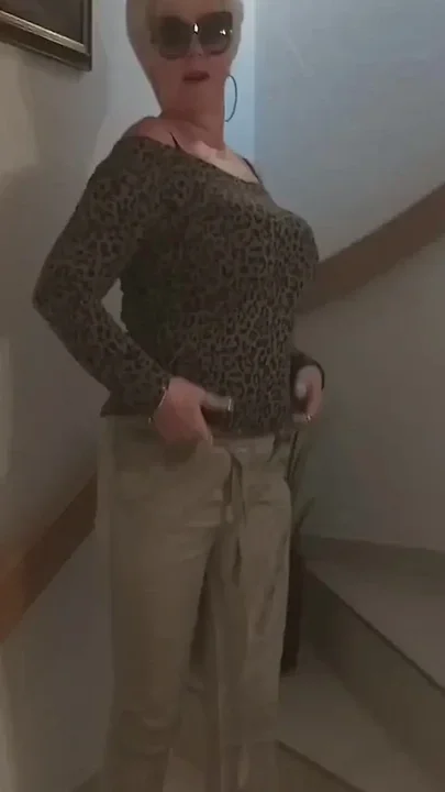 Horny Granny Masturbates on the Stairs