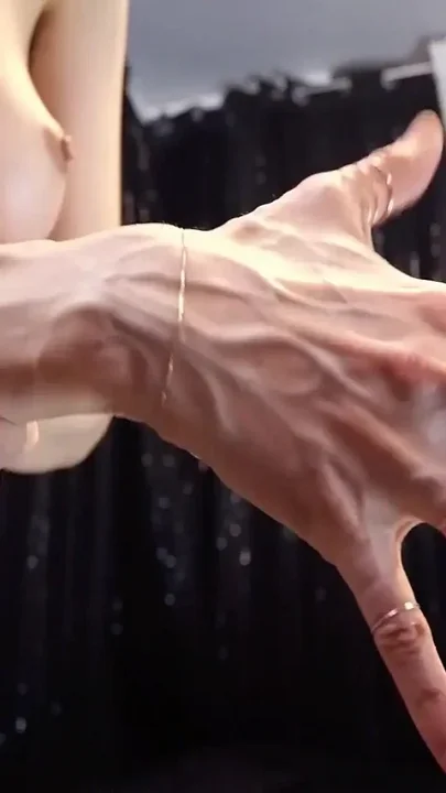 Rebecca Diamante Shows Her Hands' Veins in Topless